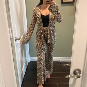 Matching set outfit. Pants with sweater. NWT never worn.